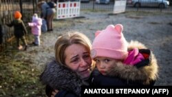 უკრაინის მოქალაქეები ზაპოროჟიეში. 7 ნოემბერი, 2022 წელი.