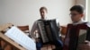 Moldova, Petru Babin, young accordion teacher in Cimislia school of arts