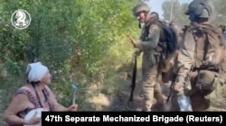 Українські вояки в Роботиному Запорізької області на тлі українського контрнаступу. 22 серпня 2023 року