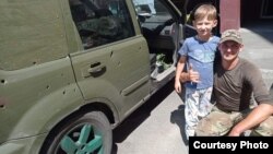 Володимир Коляда із сином брата Василя Андрійком.