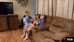 Юлія з Миколаївщини з своїми новими братиками-американцями