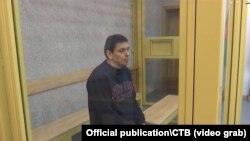 Колишній журналіст Радіо Свобода Ігор Карней під час судового засідання. Мінськ, 21 березня 2024 року