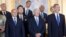 U.S. President Joe Biden (front center) and Hungarian Prime Minister Viktor Orban (back left) -- along with other European leaders -- attend a NATO event in Madrid in June 2022. Biden has excluded Orban from the list of invitees to his Summit for Democracy twice: in 2021 and this week.