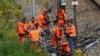 Железничари работат на санирање на штетите, 27 јули 2024 година.