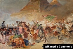 Поляк сүрөтчүсү Войцех Коссак (1857—1942) египеттик пирамидаларга жакын жерде 1798-жылы 21-июлда франсуз баскынчыларынын египеттик мемлүк атчан аскери менен салгылашуусун 1896–1900-жылдары боёк сүрөттүк панорама кылып чагылдырган. Сүрөттүн бир бөлүгү..