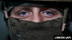 Український оборонець Бахмута. 21 лютого 2023 року. Російська армія атаку місто, починаючи з липня 2022 року