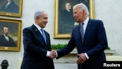 Predsjednik SAD-a Joe Biden sa izraelskim premijerom Benjaminom Netanyahuom u Ovalnoj kancelariji u Bijeloj kući u Washingtonu, SAD, 25. jula 2024. 