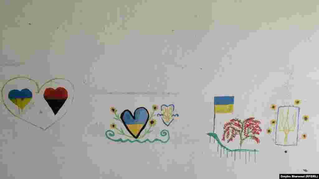 Малюнки дітей на стіні зруйнованого класу