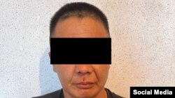 Кылмышка шектүүнүн Ички иштер министрлиги тараткан сүрөтү.