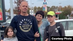 Alyona Podlesnykh and her family in Serbia