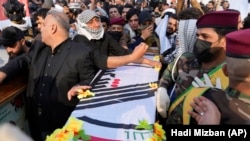 مراسم خاکسپاری ابوباقر الساعدی در بغداد