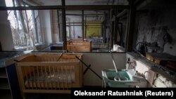 Oštećena bolnica u ruskom granatiranju Hersona, 1. januar 2023. 