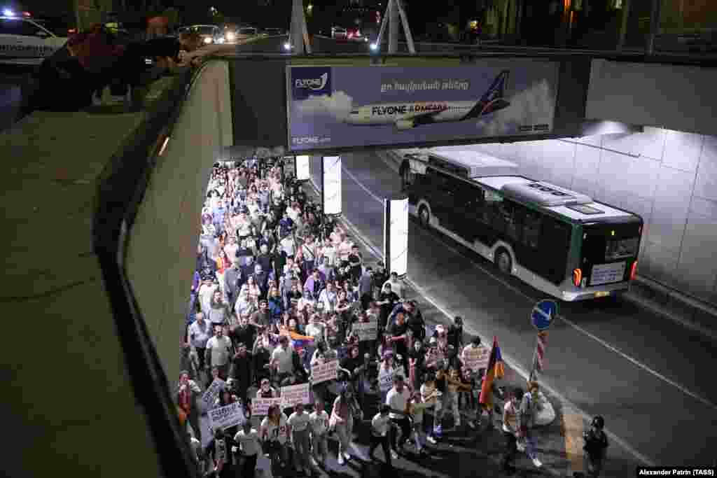 The July 25 protest marches through a motorway tunnel in Yerevan.&nbsp; The ICRC say the last time they were able to bring medicines and essential food items through Azerbaijan&#39;s blockade, &quot;was several weeks ago.&quot; &nbsp;