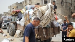 Stanovništvo se priprema za evakuaciju, nakon što su izraelske snage pokrenule kopnenu i zračnu operaciju u istočnom dijelu Rafaha, 11. maja 2024.