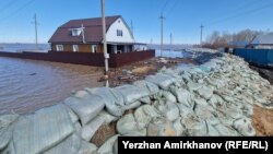 One of four dams hold back water to keep the Beskol village from flooding in the Kyzylzhar district of northern Kazakhstan on April 17.
