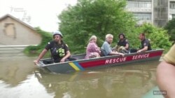 Суу астында калган Херсон, эвакуацияланган эл 