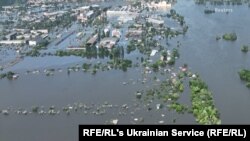 Inundații după distrugerea barajului din Kahovka. 