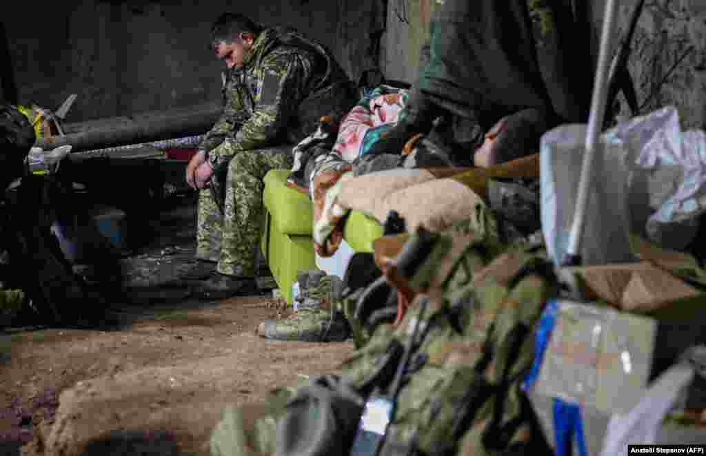 Ukrainian soldiers rest in a dimly lit and cramped basement as artillery rumbles above. &quot;We&#39;re tired,&quot; said a deputy battalion commander whose call sign is Philosopher. &quot;Little by little, (Russian forces) are nibbling away little pieces.&quot;&nbsp;