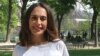 Iranian-Belgian human rights activist Darya Safai poses for a photograph in a park in the French capital Paris on April 14, 2017.