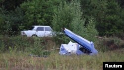 Уламки на місці падіння літака Пригожина