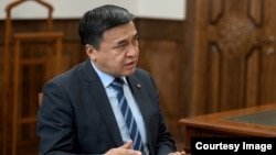 Каныбек Иманалиев.