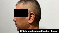 Кылмышка шектүү Кызыл-Туу айылынын мурдагы башчысы. 