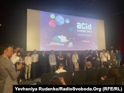 Команда стрічки «Звідки куди» на презентації у Каннах. 22 травня 2023 року