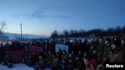 Fotografia unor prizonieri de război ucraineni după un schimb făcut cu rușii, la 16 februarie.