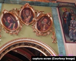 Captură din filmul de prezentare a Bisericii cu două turnuri din Lugoj realizat de Adriana Weimer. În colțul din dreapta se vede parțial mozaicul de ctitor comandat de Iosif Constantin Drăgan, alături de soția defunctă și de mama sa, în vestminte bizantine.