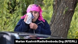 Коопсуз аймактарга көчүрүлүп жаткан Волчанск шаарынын тургундары.12-май, 2024-жыл.