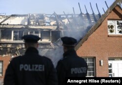 آتش‌سوزی در یک سرپناه پناهجوبان اوکراینی در نزدیکی ویسمار در شمال شرقی آلمان در اکتبر ۲۰۲۲