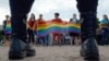 People wave rainbow flags at a gay pride rally in St. Petersburg in 2017.