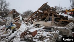 Будинок, зруйнований російським ракетним ударом у місті Зміїв на Харківщині, 8 січня 2024 року