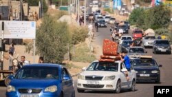 პალესტინელები ტოვებენ ღაზას ისრაელის არმიის გაფრთხილების შემდეგ. 2023 წლის 13 ოქტომბერი
