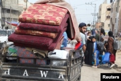 Palestinci se pripremaju za evakuaciju, nakon što su izraelske snage pokrenule kopnenu i zračnu operaciju u istočnom dijelu grada Rafaf, 11. maja 2024.