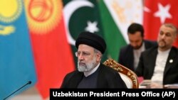 Президент Ирана Эбрахим Раиси на саммите Организации экономического сотрудничества в Ташкенте. 9 ноября 2023 года