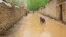 GRAB Muddy Floodwaters Surge Through Afghan Villages