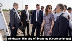 Максим Решетников (в центре) и Кристина Озган