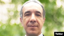 عکسی که سایت «ماده ۱۸» از رحمت رستمی‌پور، نوکیش مسیحی، منتشر کرده است