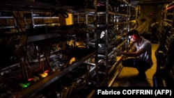 Pajisje për prodhimin e kriptovalutave - Fotografi nga arkivi.