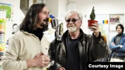 Sriitorii Emilian Galaicu-Păun și Eugen Cioclea.