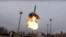 An intercontinental ballistic Avangard missile lifts off from a truck-mounted launcher somewhere in Russia in this undated photo.