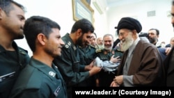 Supreme Leader Ayatollah Ali Khamenei meets with the IRGC members involved in the arrest of U.S. sailors in the Persian Gulf in January 2016.