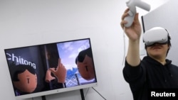 Virtualno okupljanje u jednom uredu u Pekingu, Kina, 21. siječnja 2022.