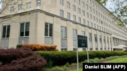 Америка Кошмо Штаттарынын Мамлекеттик департаменти.