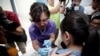 A woman from Beijing receives an injection of the Gardasil 9 human papillomavirus (HPV) vaccine, which, according to local media, is the first in mainland China, at a hospital in Boao, Hainan province, China May 30, 2018.