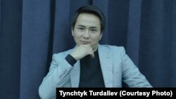 Максат Жангазиев.