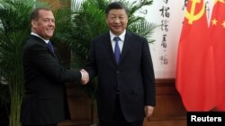 Former Russian President Dmitry Medvedev met with Chinese President Xi Jinping on December 21.