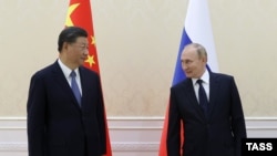 Hszi Csin-ping kínai és Vlagyimir Putyin orosz elnök az üzbegisztáni Szamarkandban 2022. szeptember 15-én
