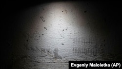 Стіна в одній із катівень Херсона